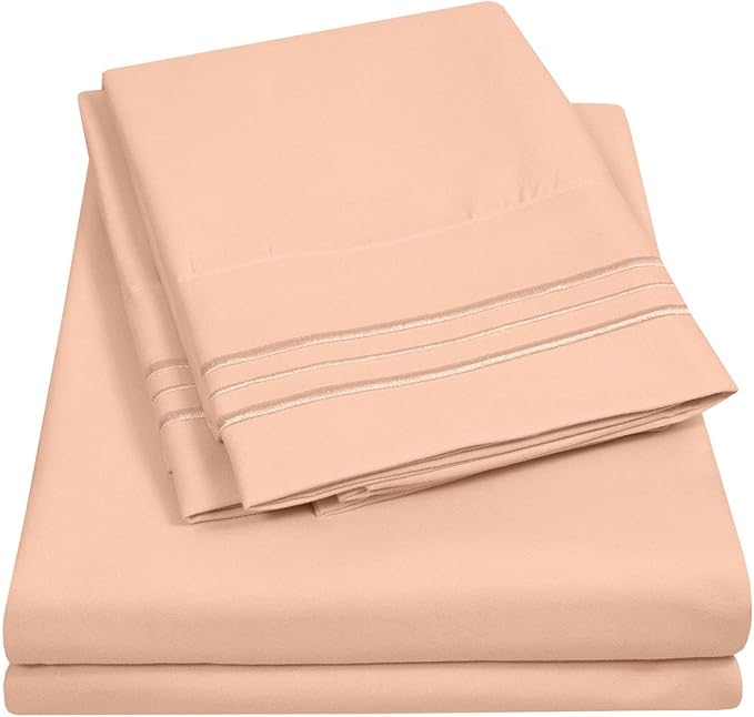 Queen Size Sheet Set with Built-in Sheet Straps - Deep Pocket Fitted Sheet, Flat Sheet & Pillowcases - Soft, Wrinkle-Free, Secure Fit - Peach