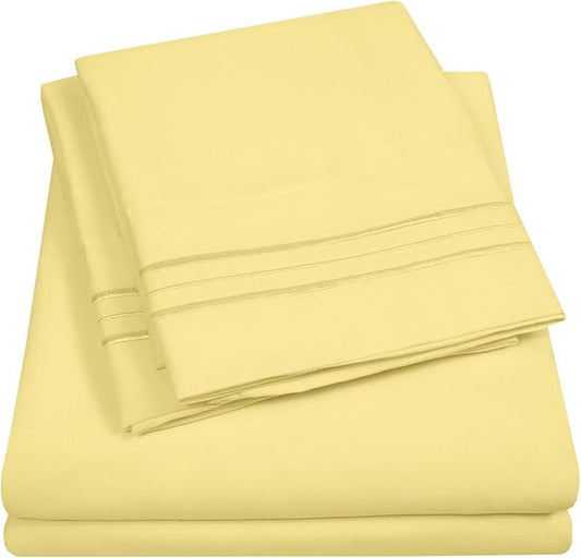 Twin Size Sheet Set with Built-in Sheet Straps - Deep Pocket Fitted Sheet, Flat Sheet & Pillowcases - Soft, Wrinkle-Free, Secure Fit - Pale Yellow