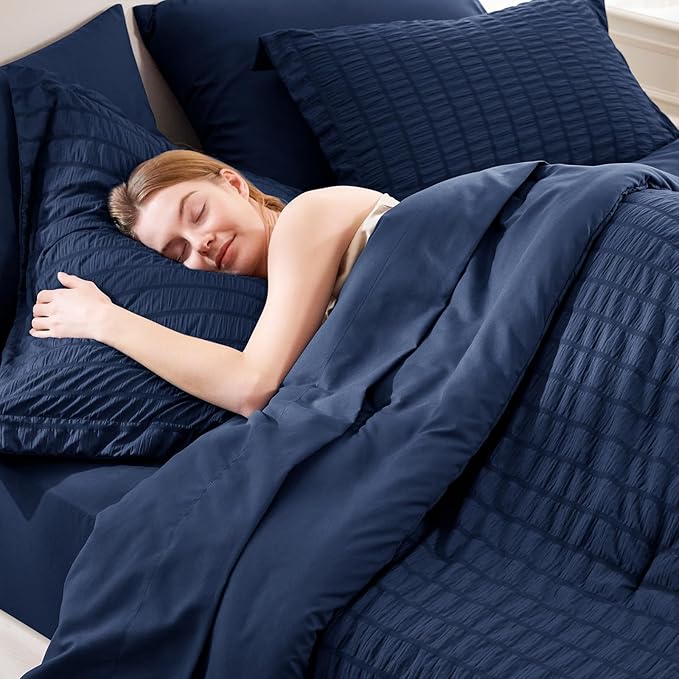 CozyLux Oversized King Comforter Set Navy Blue Seersucker 7 Pieces 120x98 Bed in a Bag Comforter Set with Sheets, Luxury Soft Bedding Sets with Down Alternative Comforter, Sheets, Pillowcases & Shams