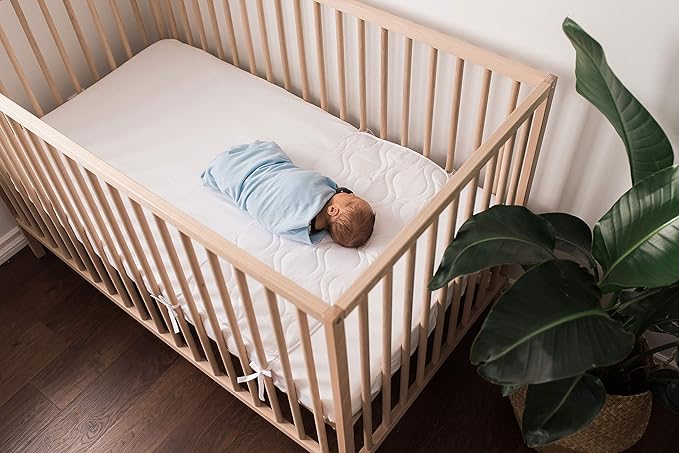 Sheet Saver Waterproof Crib Sheet Protector Pad 13x26 with Tie Straps for Standard Cribs | Absorbent Leak Pad for Spit?€?Up & Drool | Made in USA by SheetWorld