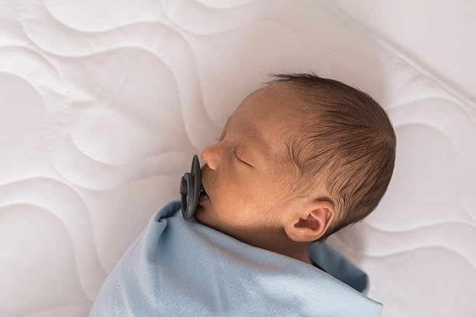 Sheet Saver Waterproof Crib Sheet Protector Pad 13x26 with Tie Straps for Standard Cribs | Absorbent Leak Pad for Spit?€?Up & Drool | Made in USA by SheetWorld