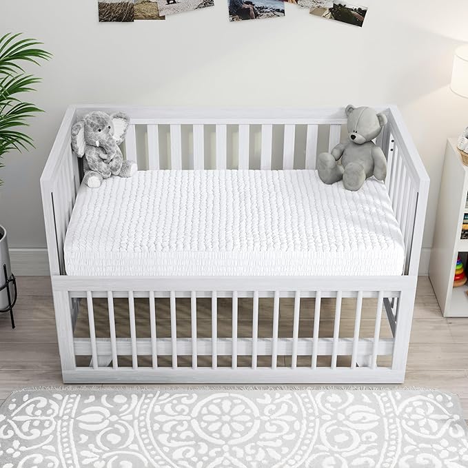 PAULATO BY GA.I.CO Waterproof Crib Mattress Protector – Absorbent Mattress Cover for Toddler & Baby – 28x52 Soft Noiseless Hypoallergenic Machine Washable – Protector with Deep Elastic Skirt